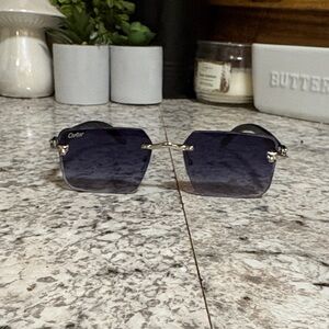 Cartier Rimless Sunglasses with Dark Lenses